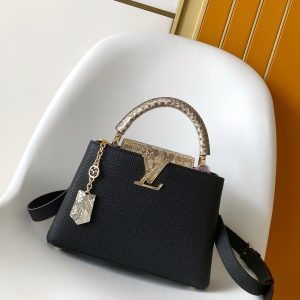 p130021 x 13.6 x 8 (cm) (Length x Height x Width) 27 x 17.3 x 9 (cm) (Length x Height x Width) • Taurillon calf leather • Taurillon calf leather trim • Calf leather lining • Metal hardware • Flap can be positioned inside or outside • Compartment features zippered pocket and slip pocket • Metal studs • Holds smartphone, LV Vertical wallet, headphones,keys, and lipstick • Shoulder strap: detachable, adjustable • Half strap length: 46.5 cm • Adjustable half strap length: 55.0 cm • Handle: single handle